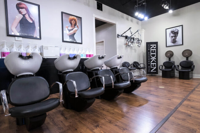 Hair salon shampoo stations and chairs.