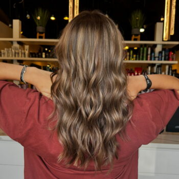 Long brown wavy hair, back view.